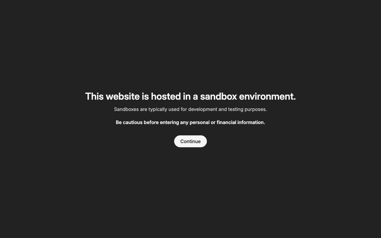 Dark full-screen notice: This website is hosted in a sandbox environment. Continue button.
